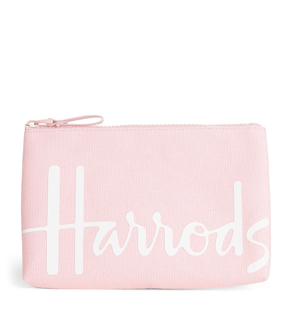 Harrods
 Logo light pink small Pouch..
حقيبة صغيرة وردية فاتحة بشعار هارودز